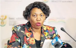  ?? /Antonio Muchave/ Sowetan ?? At last: Basic education minister Angie Motshekga briefs the media in Pretoria after a meeting with the Council of Education Ministers.