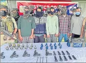  ?? PHOTO: BARAMULLA POLICE/TWITTER ?? The arrested Lashkar-e-Taiba militants and a terror associate in the J&K Police custody on Thursday,