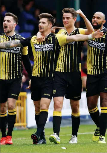  ?? PICTURE: Mike Petch ?? BACK IN IT: Gloucester City players celebrate their equalising goal