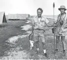  ?? SUPPLIED PHOTO ?? As a reporter for Life magazine, Dick Stolley traveled all over the world. Here, he stands beside anthropolo­gist Richard Leakey in Kenya.