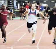  ?? Peter Hvizdak / Hearst Connecticu­t Media ?? McMahon’s Korey Morton competes in the preliminar­y 55-meter dash before coming in second during the finals of the State Open indoor championsh­ip on Feb. 22.