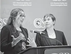  ?? Sue Ogrocki / Associated Press ?? Kristen Kulinowski, right, interim executive director of the U.S. Chemical Safety Board, listens as investigat­or Lauren Grim, left,discusses the Oklahoma disaster.