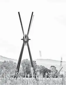  ?? BRYAN DERBALLA/THE NEW YORK TIMES PHOTOS ?? Mark di Suvero’s newly exhibited E=MC2, which is nearly 100 feet tall, at Storm King Art Center in the Hudson Valley, in Cornwall, N.Y., on July 8.