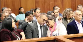  ??  ?? Omesh Ramnarain is consoled by family members before being sentenced to 10 years’ imprisonme­nt for the death of two cyclists in February 2016.