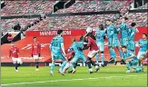  ?? REUTERS ?? Man United's Bruno Fernandes (L) scores off a free-kick against Liverpool during their FA Cup match on Sunday.