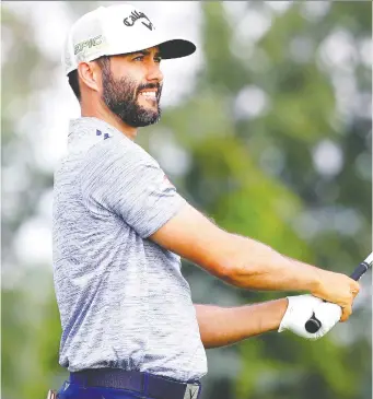  ?? KEVIN C. COX/GETTY IMAGES ?? Canadian golfer Adam Hadwin has not played a competitiv­e round in more than a month. He says the time off has allowed him to reset mentally and continue to enjoy the sport.