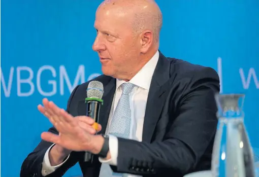  ?? /Reuters ?? Clear path: Goldman Sachs CEO David Solomon speaks on a panel at the annual meetings of the IMF and World Bank in Washington on October 18.