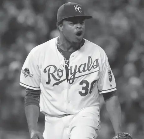  ?? CHARLIE RIEDEL/THE ASSOCIATED PRESS ?? Kansas City Royals starter Edinson Volquez celebrates after striking out Troy Tulowitzki to end a threat in the sixth after walking the first two Jays batters.