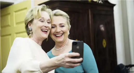  ?? KEVIN WOLF / THE ASSOCIATED PRESS ?? Hillary Clinton’s first foray into the selfie world was with Meryl Streep at last year’s Kennedy Honors.