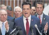  ?? AFP ?? Flanked by about two dozen House Republican­s, Rep Matt Gaetz, centre, speaks during a press conference in Washington on Wednesday.