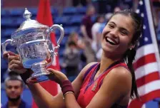  ?? GETTY IMAGES ?? BRITISH INVASION: Britain’s Emma Raducanu celebrates after winning the U.S. Open on Saturday in New York.