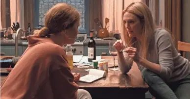  ?? PHOTOS BY MELINDA SUE GORDON/NETFLIX ?? Amy Adams, left, and Julianne Moore in a scene from “The Woman in the Window.”