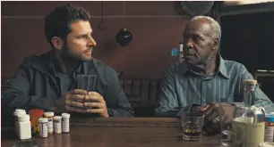  ?? Bugsby Films ?? James Roday (left) and Danny Glover in the comedy “Pushing Dead.” Writer/director Tom E. Brown will answer questions at the Roxie.