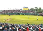  ??  ?? Darren Clarke, below, savoured the moment of victory on the final green of Royal St George’s during the 2011 Open, above