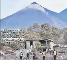  ??  ?? The Fuego Volcano continues to release ash and smoke, as seen from the village of San Miguel Los Lotes. — AFP photo