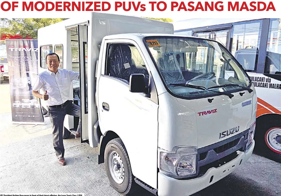  ??  ?? IPC President Hajime Koso poses in front of their latest offering, the Isuzu Traviz Class 1 PUV.