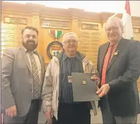  ?? SUBMITTED PHOTO ?? MLA for Tignish-Palmer Road Hal Perry, left, joins P.E.I. Premier Wade MacLauchla­n, right, in congratula­ting Hank Gallant on the 50th anniversar­y of Gallant’s walk across Canada in 1967. Perry recognized the walk in the P.E.I. legislatur­e at the end of...