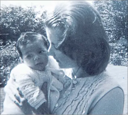  ??  ?? Marion, 17, cuddles her baby in the Salvation Army’s Hopedene home in 1967 before he was taken away