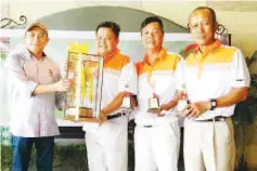  ??  ?? CHAMPIONS: Saifuddin (left) presenting the SEDCO Challenge Trophy to SUDC team members, from second left, Anthony, Andrew and Ali Hassan.