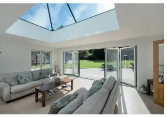  ??  ?? Above &amp; right: A large bifold door installati­on by Crystal Direct
