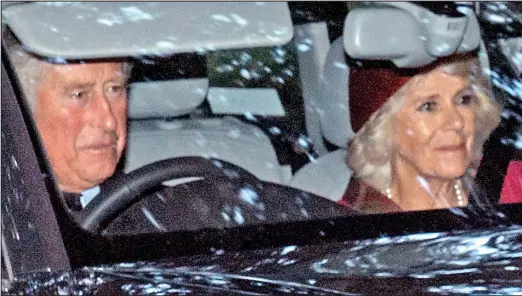  ??  ?? Popularity waning: Prince Charles and Camilla drive to church near Balmoral yesterday