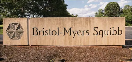  ?? Mel Evans/Associated Press ?? Drugmaker Bristol Myers Squibb is acquiring Karuna Therapeuti­cs, a biopharmac­eutical company that has developed a new antipsycho­tic, in a $14 billion deal. Bristol Myers Squibb and Karuna announced their merger agreement on Friday.