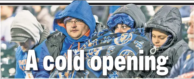  ??  ?? BATTER ... UH ... BUNDLE UP! Mets fans may have to bring the blankets and parkas when the Amazin’s start the 2018 regular season on March 29 in Queens.