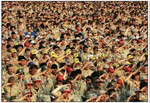  ?? AP file photo ?? Scouts recite the Pledge of Allegiance during the 2005 Boy Scout Jamboree in Bowling Green, Va. A bankruptcy by the organizati­on “would be bigger in scale than any other sex abuse bankruptcy,” said Seattle-based attorney Mike Pfau, whose firm is representi­ng more than 300 sexual abuse victims in New York state.