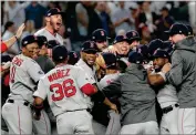  ?? AP PHOTO BY FRANK FRANKLIN II ?? The Boston Red Sox celebrate after beating the New York Yankees 4-3 in Game 4 of baseball's American League Division Series, Tuesday, Oct. 9, in New York.