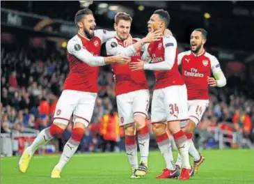  ?? AP ?? Mathieu Debuchy (second from left) scored his first goal for Arsenal in almost three years.