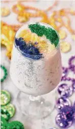  ?? Alex Montoya ?? A king cake-inspired milk punch is available through Mardi Gras season at Eunice restaurant.