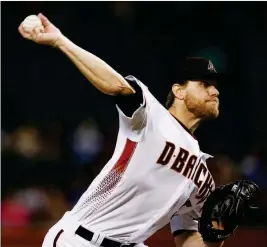  ?? ASSOCIATED PRESS ?? ARIZONA DIAMONDBAC­KS STARTING PITCHER MATT KOCH throws against the Milwaukee Brewers during the first inning of a baseball game Wednesday in Phoenix.