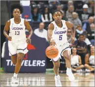  ?? Jessica Hill / Associated Press ?? UConn’s Crystal Dangerfiel­d brings the ball up the court during the first half of an exhibition game against Vanguard on Nov. 4 in Storrs.