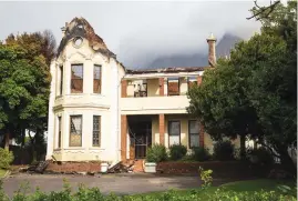  ??  ?? DESTRUCTIO­N. Cadboll House, which houses some of the University of Cape Town’s administra­tive functions, was badly damaged.