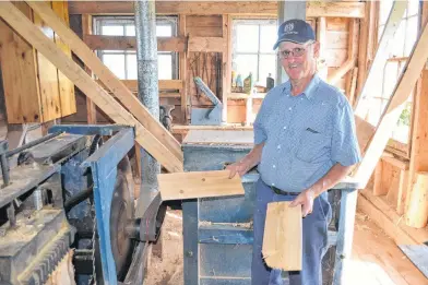  ?? SALLY COLE/THE GUARDIAN ?? Jimmy Carruthers shows some of his work at his vintage shingle mill in Hamilton, P.E.I.