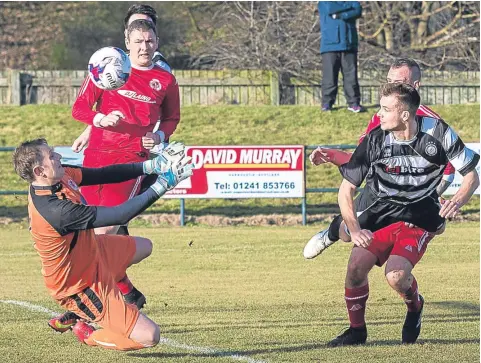  ??  ?? Gary Thom’s superb flying header gives Linlithgow the lead at Carnoustie. The visitors won 3-0.