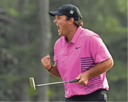  ?? MICHAEL MADRID/USA TODAY SPORTS ?? Patrick Reed held off the likes of Rickie Fowler and Jordan Spieth to win the Masters. It is his first major championsh­ip.