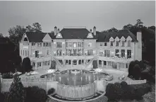  ??  ?? “Family Fued” host Steve Harvey paid $15 million for the former home of filmmaker Tyler Perry. The 35,000-square-foot mansion packs in such amenities as a billiards room, a wine cellar and a fully equipped gym. [TNS PHOTO]