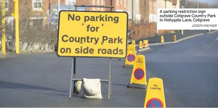  ?? JOSEPH RAYNOR ?? A parking restrictio­n sign outside Cotgrave Country Park in Hollygate Lane, Cotgrave