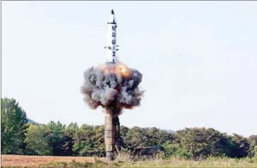  ?? KCNA VIA KNS/AFP ?? This undated picture released from North Korea’s official Korean Central News Agency on Monday shows North Korean medium-to-long range strategic ballistic missile Pukguksong-2 being launched in a test-fire.