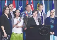  ?? CP PHOTO ?? Senator Kim Pate stands with advocates and family members of Colten Boushie, rear left to right, Eleanore Sunchild, Sheldon Wuttunee, Debbie Baptiste, mother of Colten Boushie, Alvin Baptiste, uncle of Colten Boushie, Senator Kim Pate, lawyer Chris...