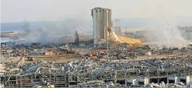  ?? — AFP ?? BEIRUT: A destroyed silo is seen yesterday amid the rubble and debris following Tuesday’s blast at the port of Lebanon’s capital.