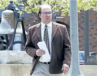  ?? Andy Petrowski enters the Welland Court House in this file photo. JULIE JOCSAK/POSTMEDIA NEWS ??