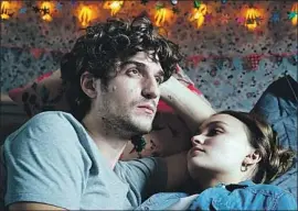  ?? Kino Lorber ?? LOUIS GARREL and Lily-Rose Depp play two characters in a love triangle.