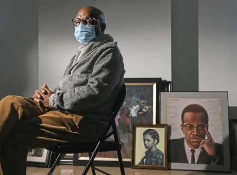  ?? Steve Mellon/Post-Gazette ?? Home health care worker Francis Adams, 71, has portraits of his grandmothe­r Berdella Adams and Malcolm X in his Washington, Pa., apartment, representi­ng the impact his grandparen­ts and the civil rights movement have had on his life.