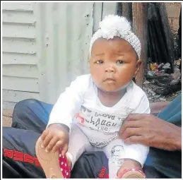  ??  ?? SO YOUNG: Seven-month-old Asesakhe, who was shot dead with her father Siyabulela Vena, 40, in their Soweto-on-Sea home