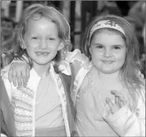  ??  ?? Michaela McCormack and Jessica Murphy at the childrens entertainm­ent at the Strawberry Festival.