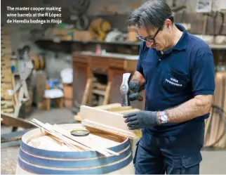  ?? ?? The master cooper making wine barrels at the R López de Heredia bodega in Rioja