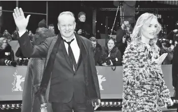  ??  ?? Swedish actor Stellan Skarsgard, German actress Nina Hoss pose on the red carpet for the premiere of the film ‘Return to Montauk’ in competitio­n at the 67th Berlinale film festival in Berlin on Wednesday. — AFP photo