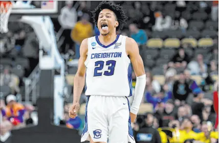  ?? Matt Freed The Associated Press ?? Trey Alexander and his Creighton teammates got through to the Sweet 16 with a double-overtime win over Oregon on Saturday. Big East rivals Uconn and Marquette are also still alive.